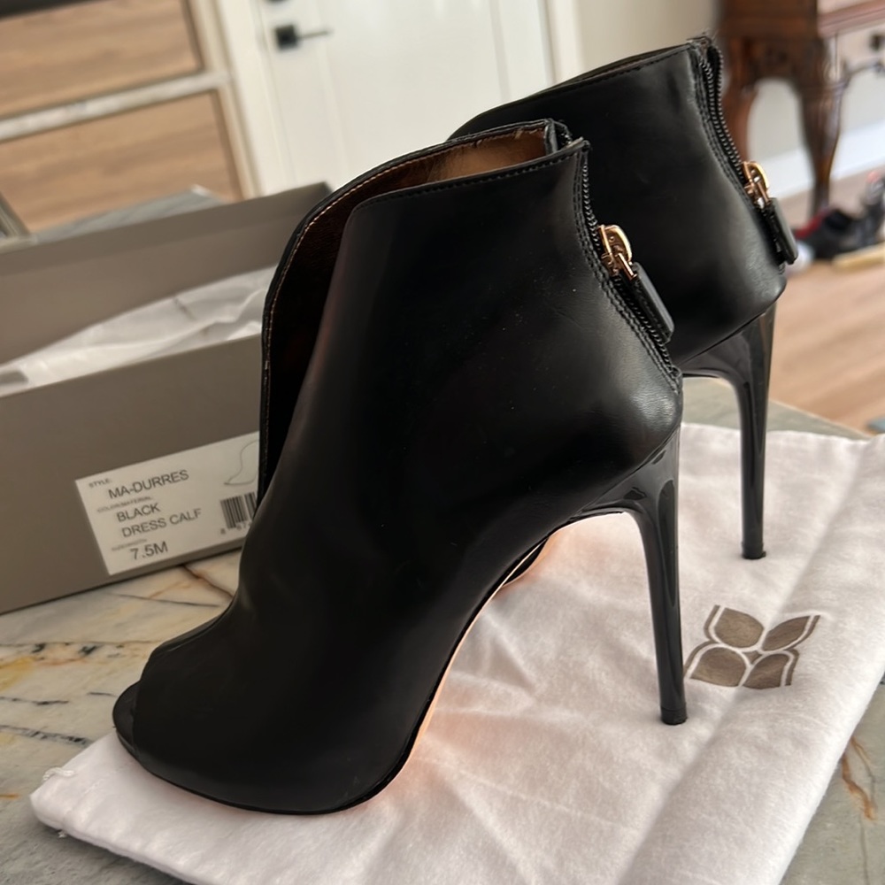 BCBG Maxazria black booties size 7.5